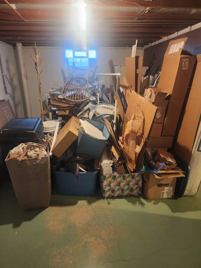 Roll-off dumpster container at job site for 2 Yard Dumpster Rental in Myrtle Beach